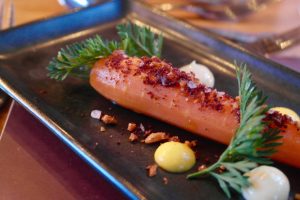 Hertford College Kitchen Compressed Confit Carrot, Carrot & Orange Puree, Roasted Garlic Aioli, Carrot Tops & Sumac