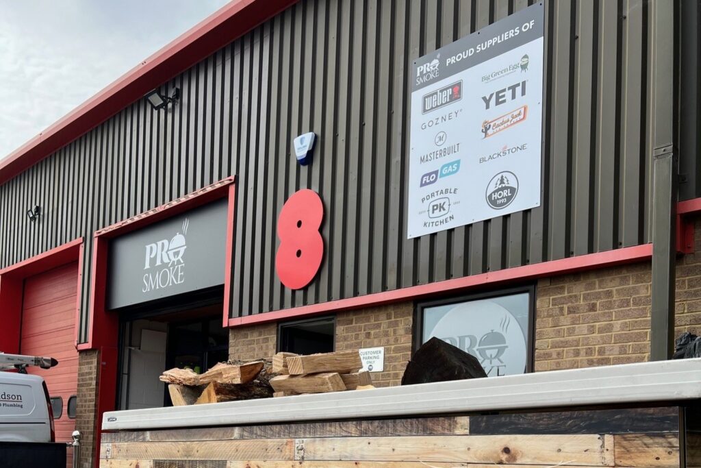 Pro Smoke frontage, with large sign, showing details of sponsored brands